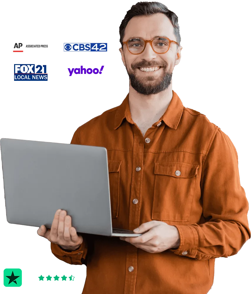Final Expense Elite agent holding a laptop, with Associated Press, CBS 42, FOX 21 and Yahoo media logos